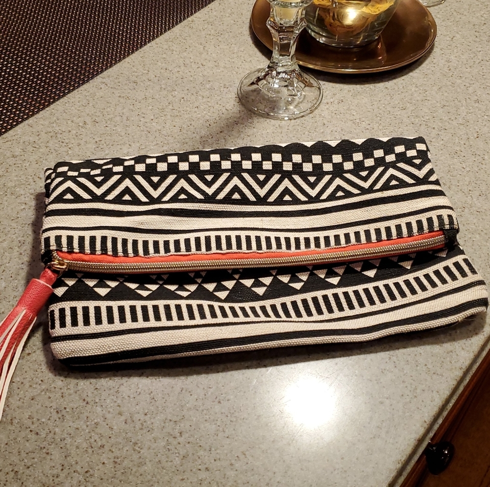 Hand held clutch